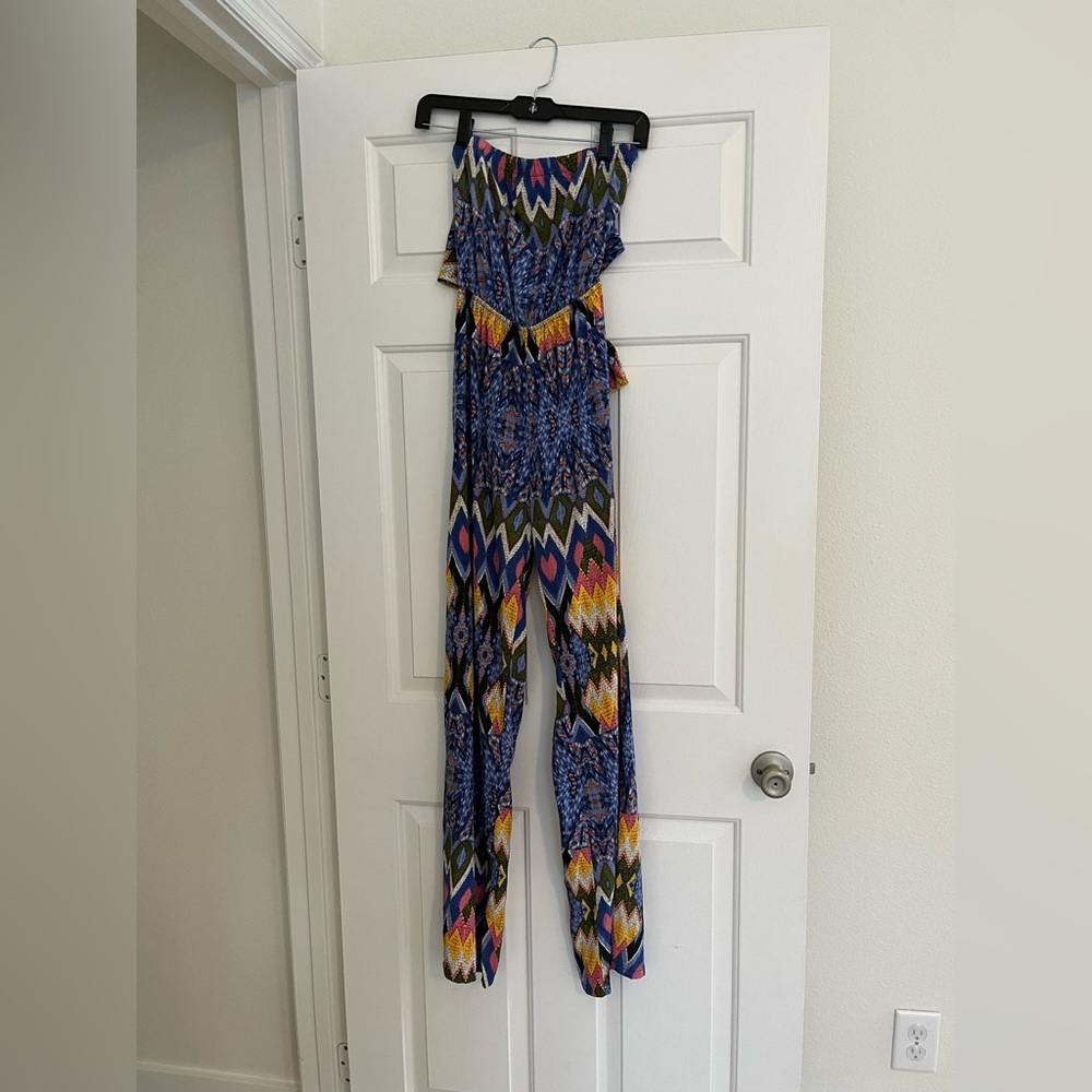 Got this from a boutique, brand is Tyche. Super cute resort romper.